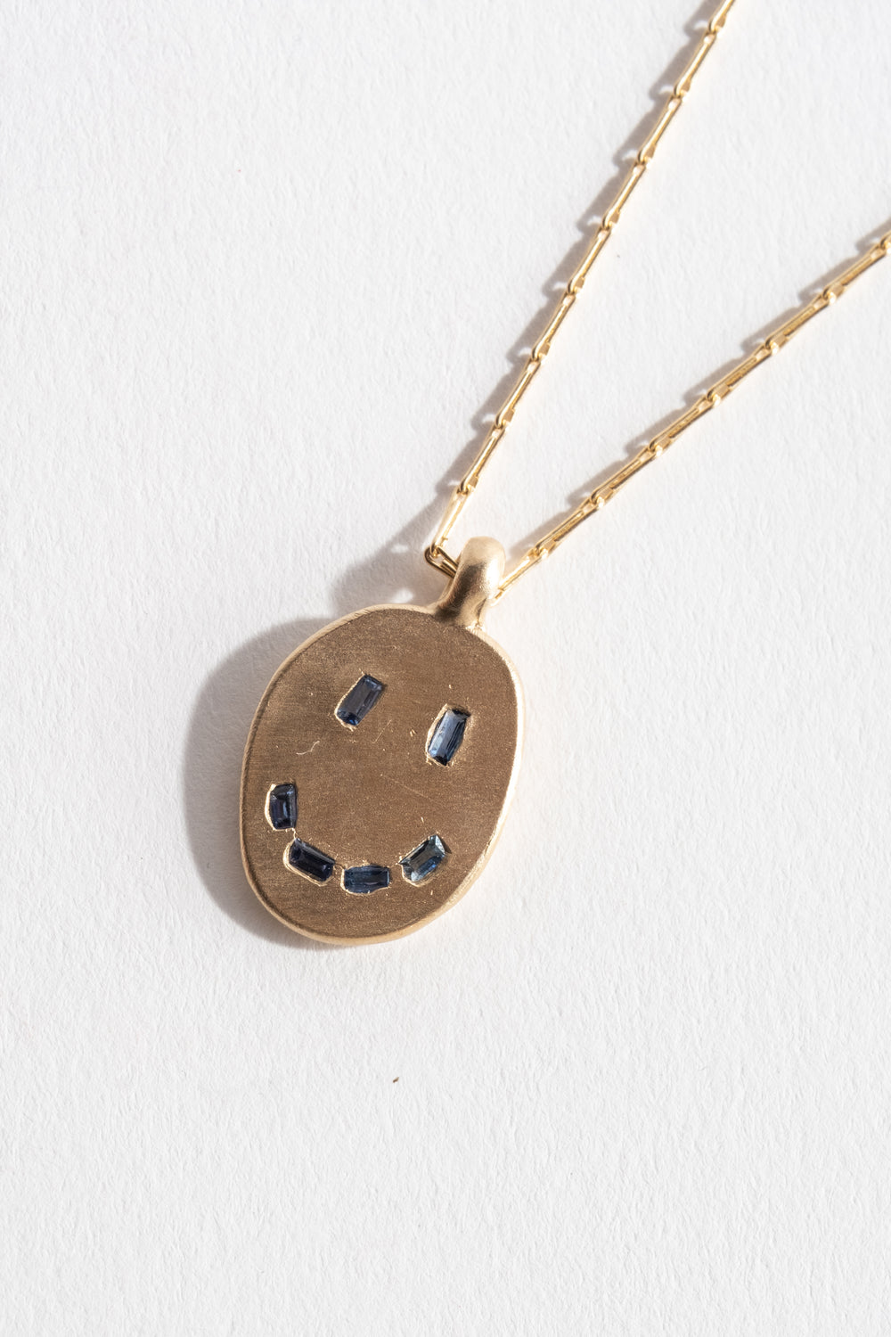 9K Sapphire Mask Pendant No. 34
