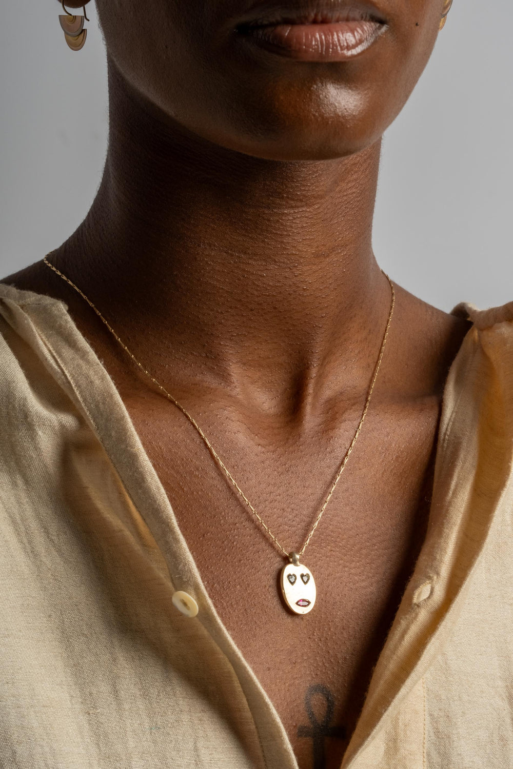 9K Sapphire Mask Pendant No. 35