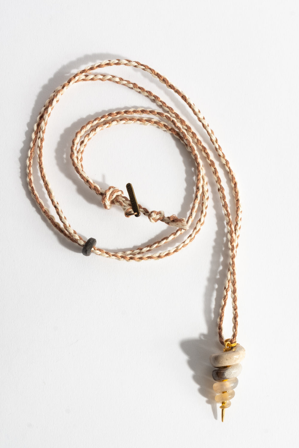 22K Fossilized Snail Pendant