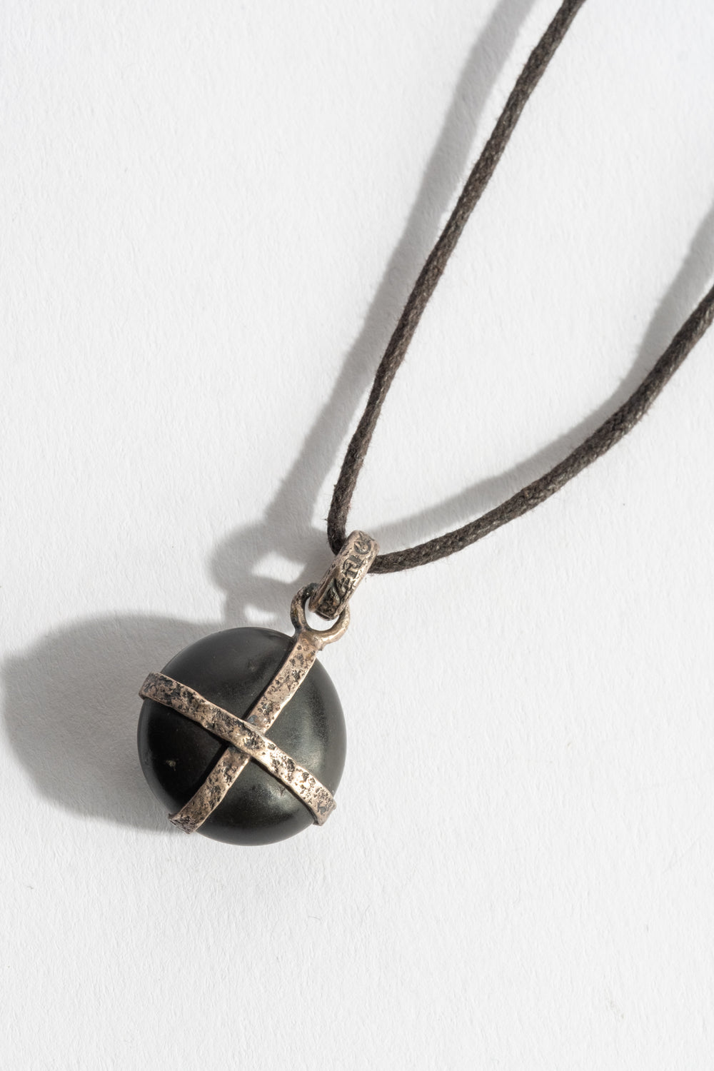 Sterling Cross Wrap Black Japanese Pebble Pendant