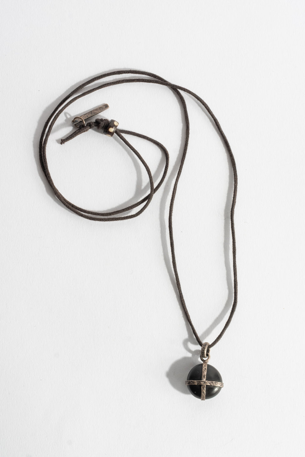 Sterling Cross Wrap Black Japanese Pebble Pendant