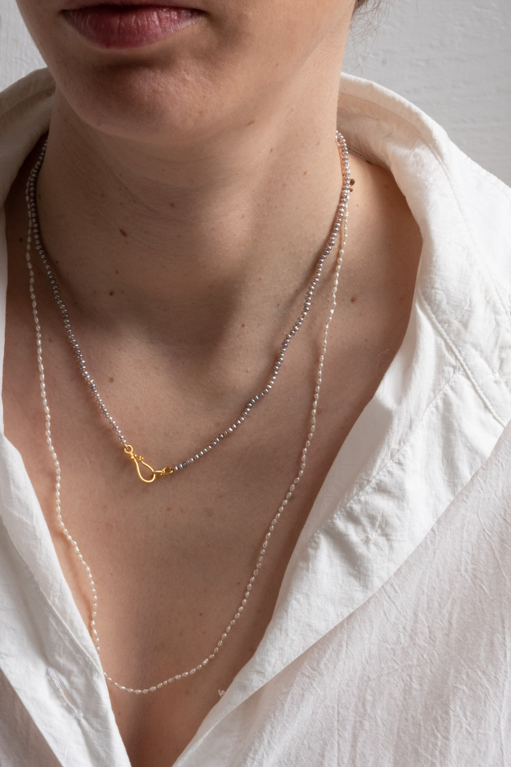 22K + Small Grey Seed Pearl Strand