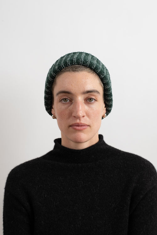 KNIT HAT IN EVERGREEN + WHITE MARL