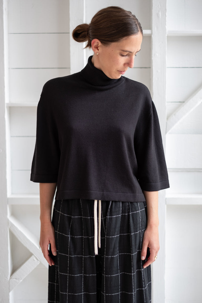 COTTON + CASHMERE TURTLENECK SWEATER IN BLACK