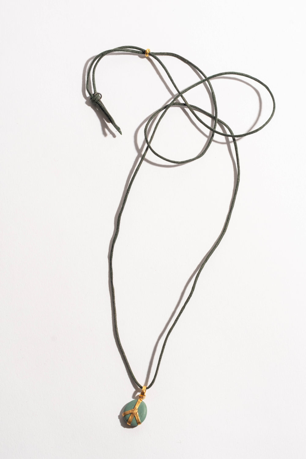 22K Indo Peace Pebble