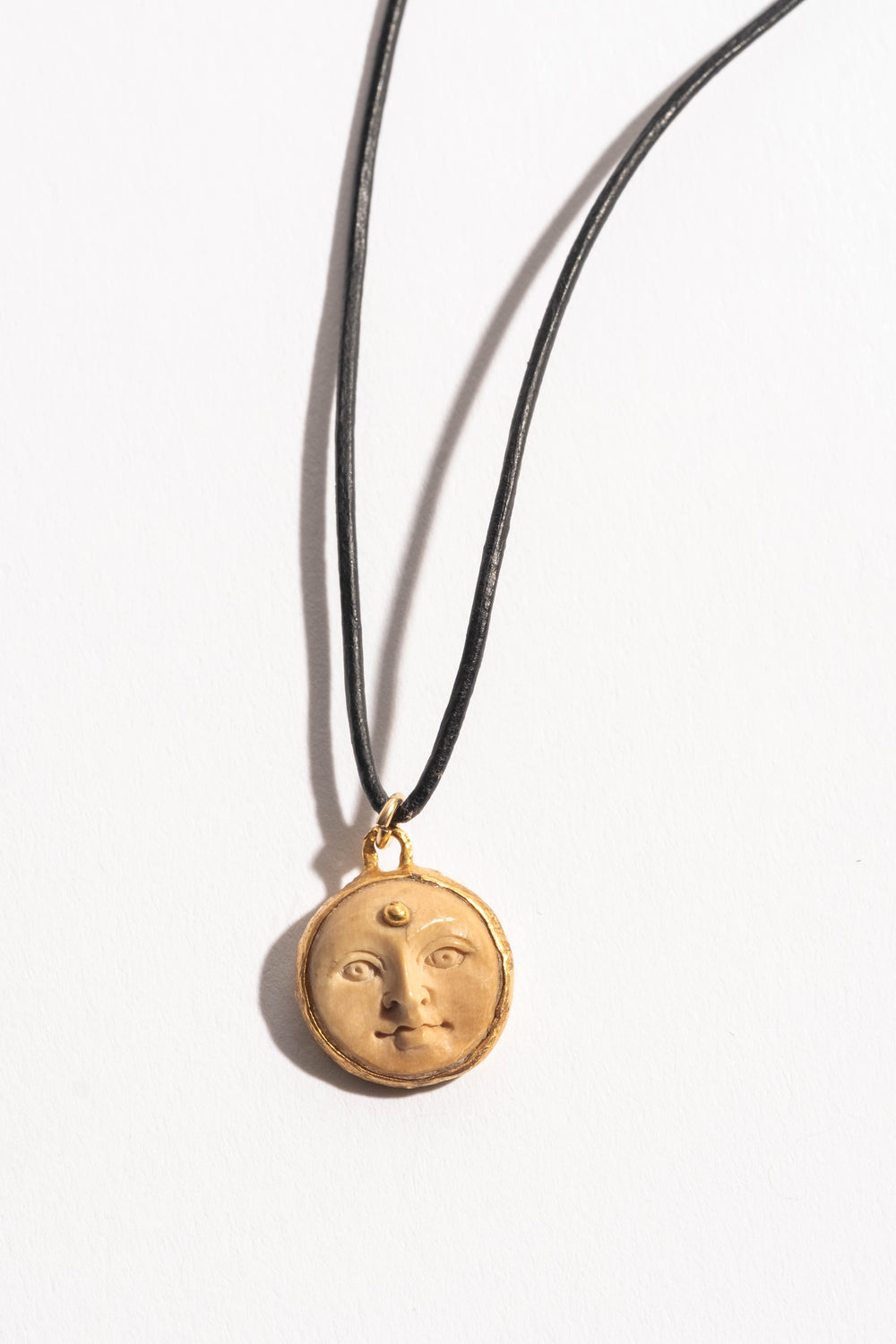 22K Bone Carved Face Pendant