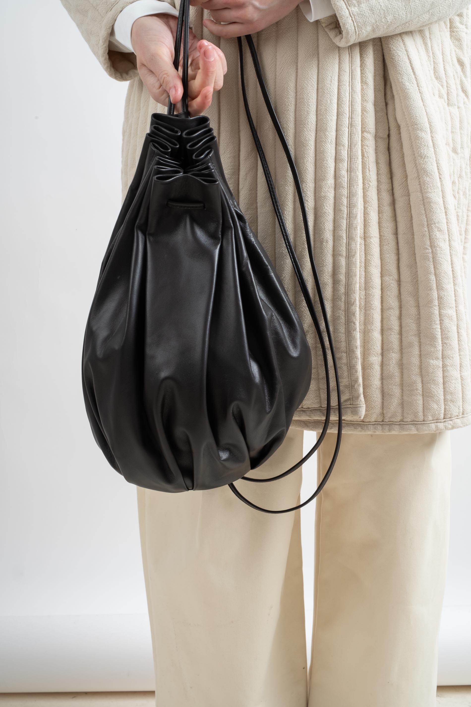 Modern Weaving | PLEATED SOFT CYLINDER CROSSBODY IN BRAUN – RELIQUARY