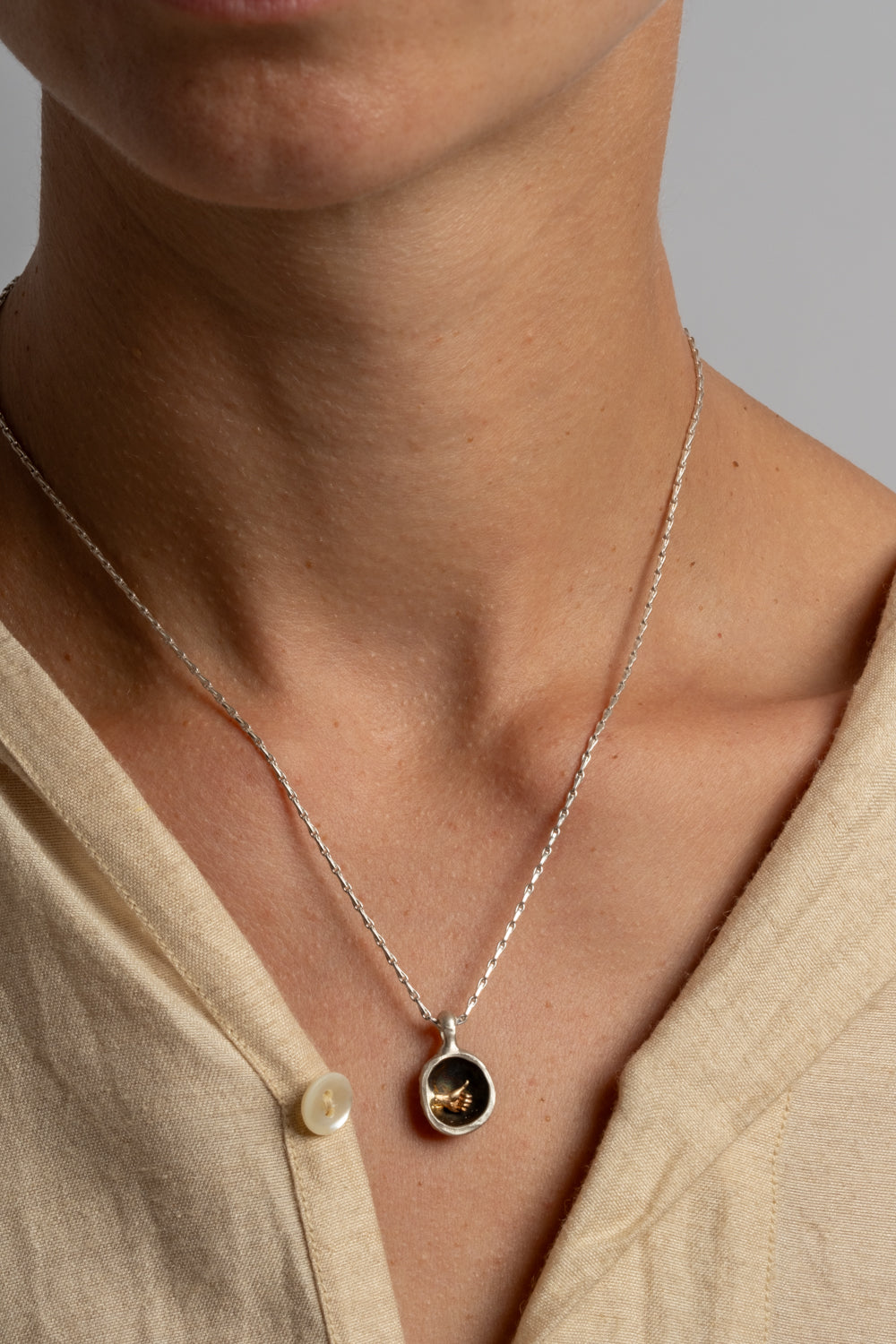 Sterling + 9K Thumbs Up Pendant