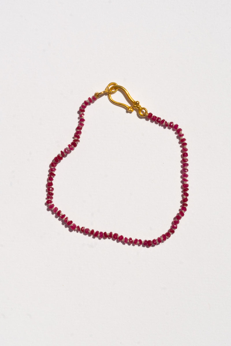 18K + RUBY BEAD STRAND BRACELET