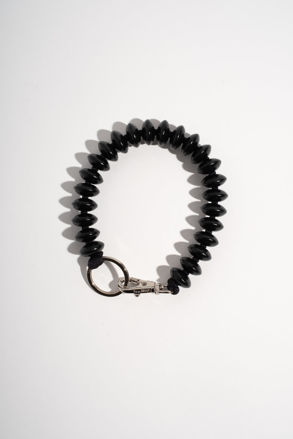 Linse Phone Keychain in Black