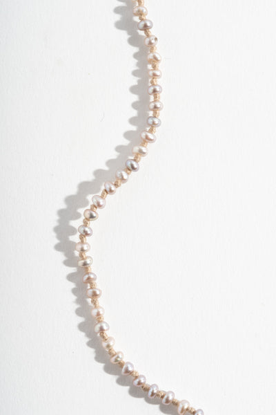 22K + Small Grey Seed Pearl Strand