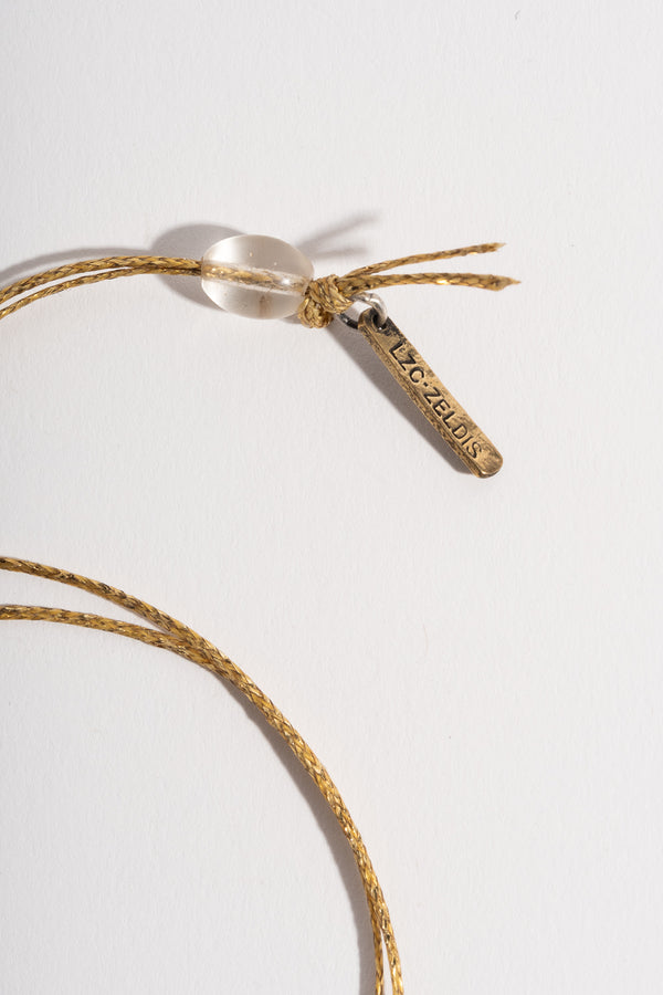 22K Gastropod Fossil Pendant