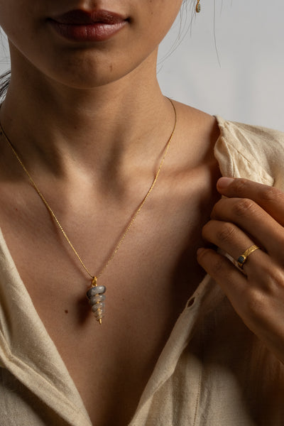 22K Gastropod Fossil Pendant