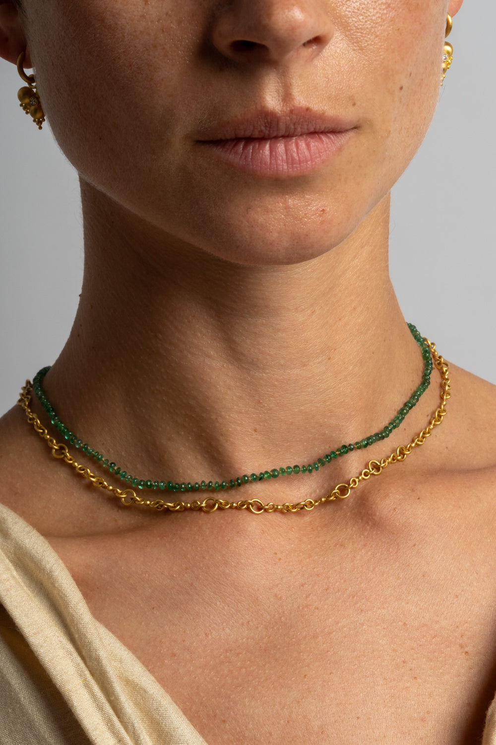 22K + Small Emerald Bead Strand