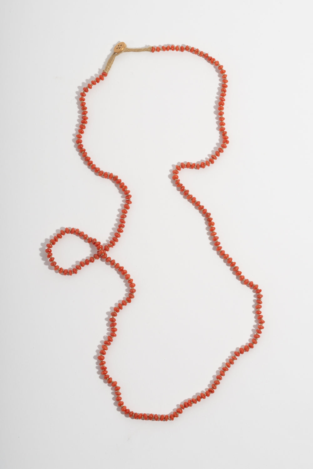 22K + Small Oval Coral Bead Strand