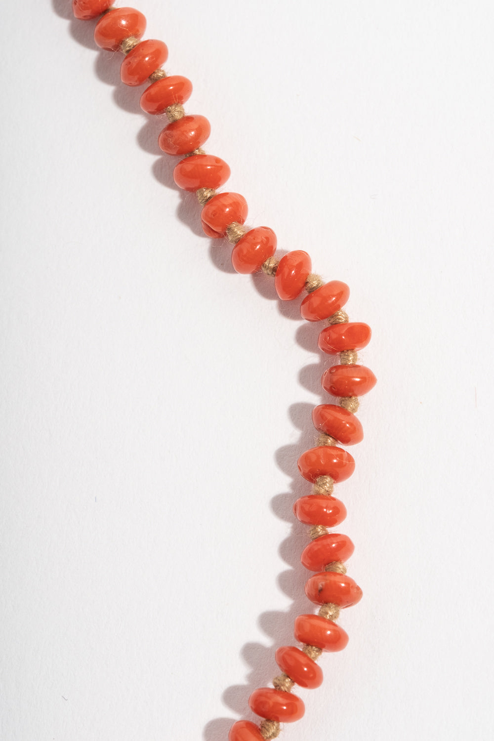 22K + Small Oval Coral Bead Strand