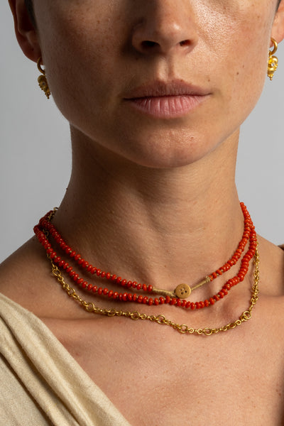 22K + Small Oval Coral Bead Strand