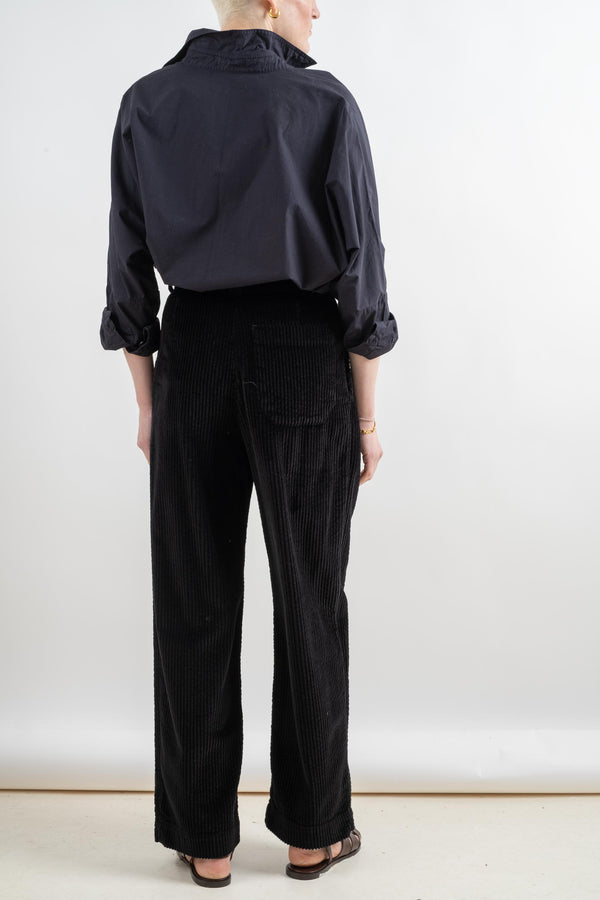 The Pleated Pant In Black Corduroy