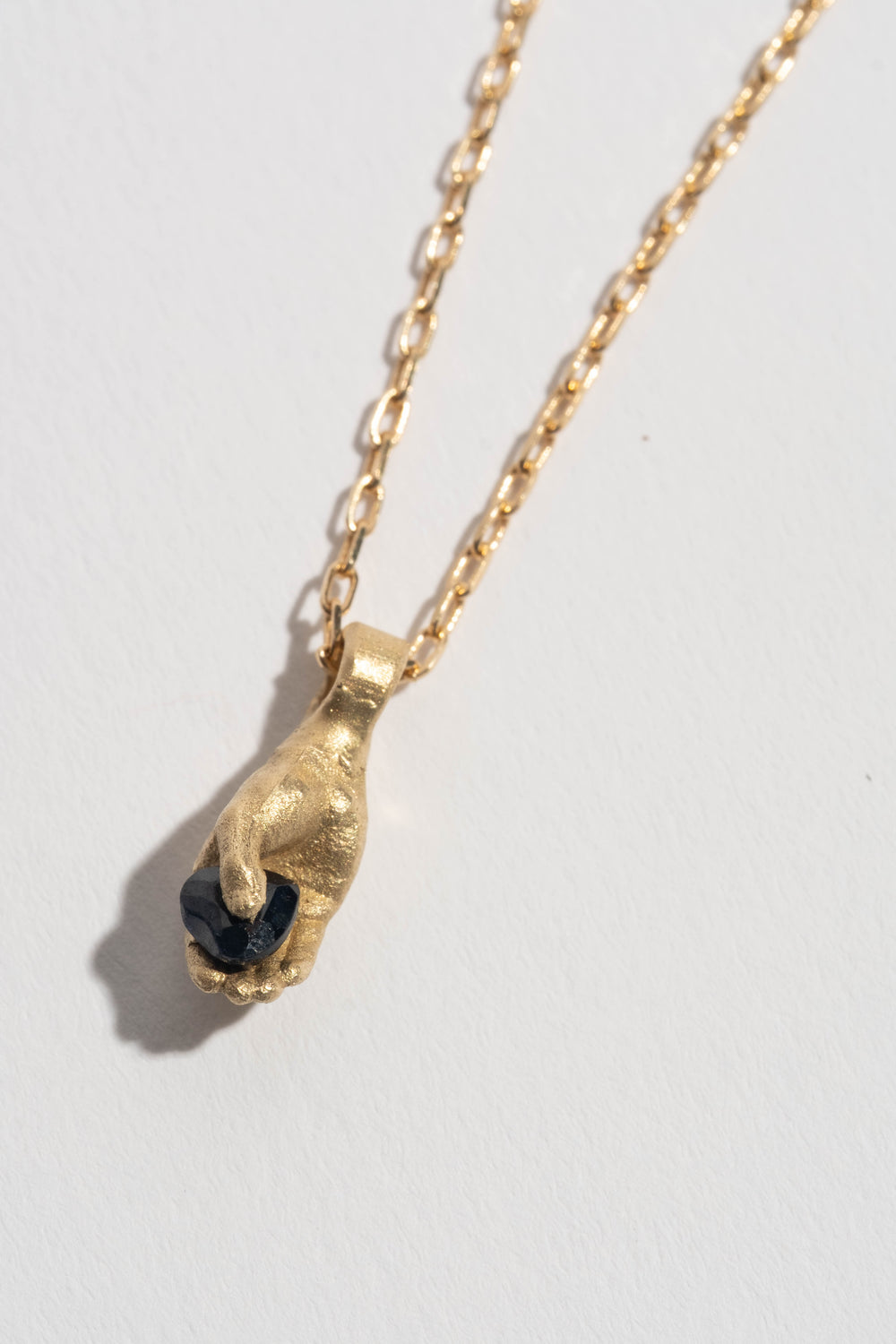 Black Heart Hand Pendant