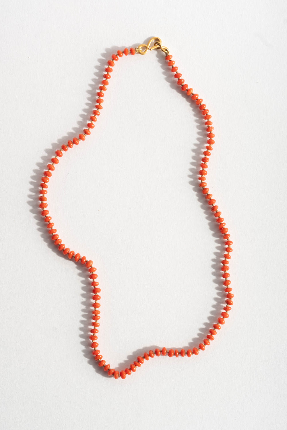 22K + Small Oval Coral Bead Strand