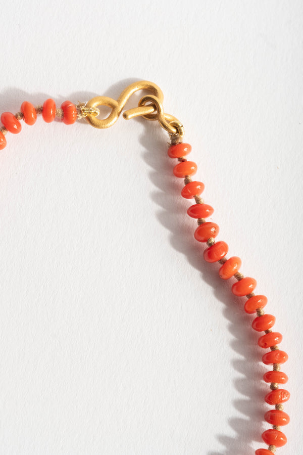 22K + Small Oval Coral Bead Strand