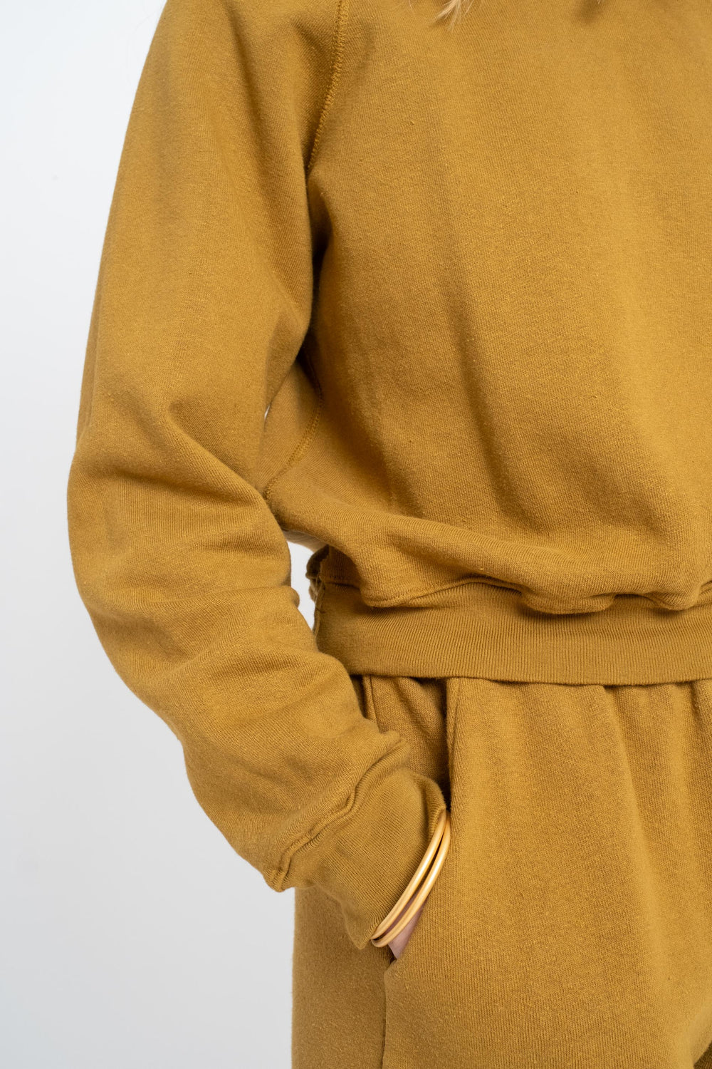 The Women's Crewneck Sweatshirt in Mustard