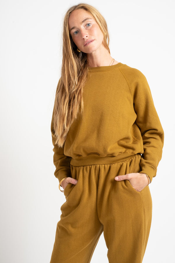 The Women's Crewneck Sweatshirt in Mustard