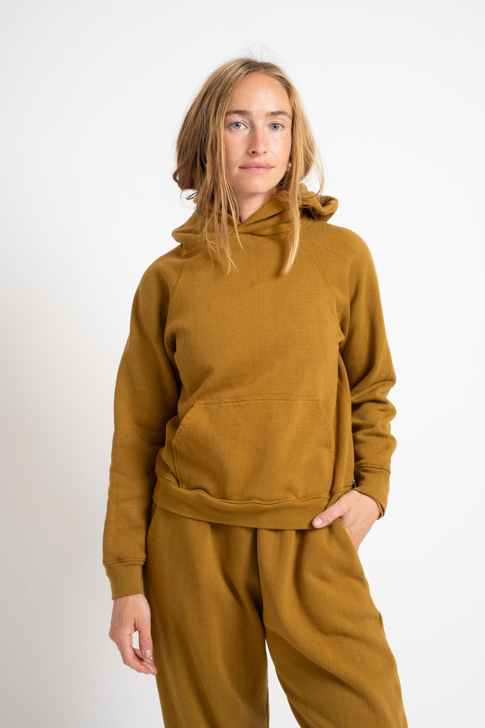 The Women's Hooded Sweatshirt in Mustard