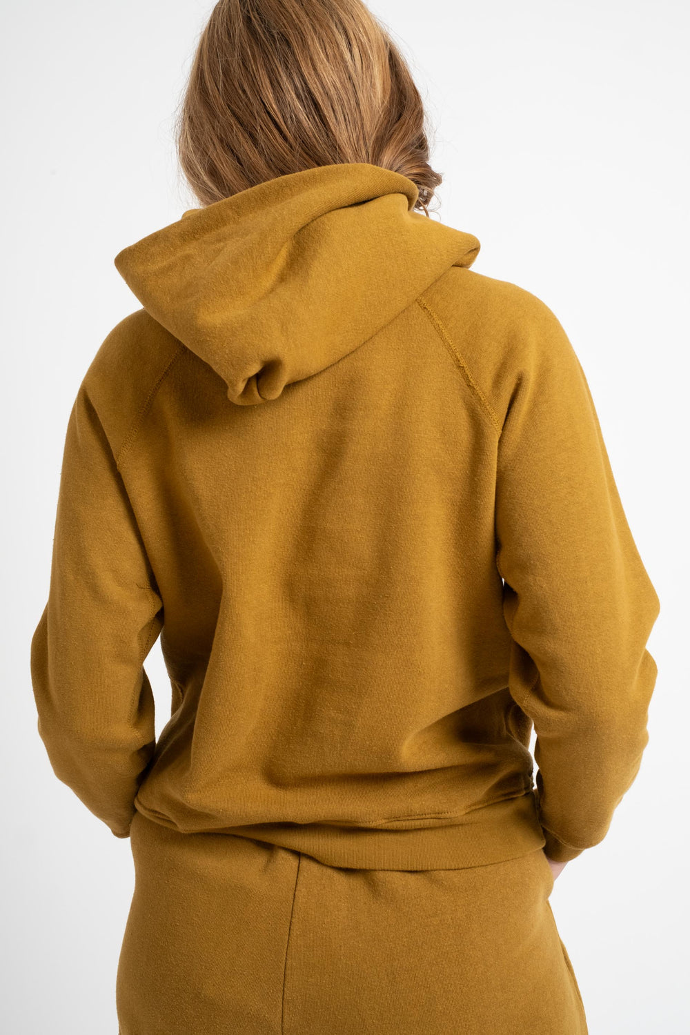 The Women's Hooded Sweatshirt in Mustard