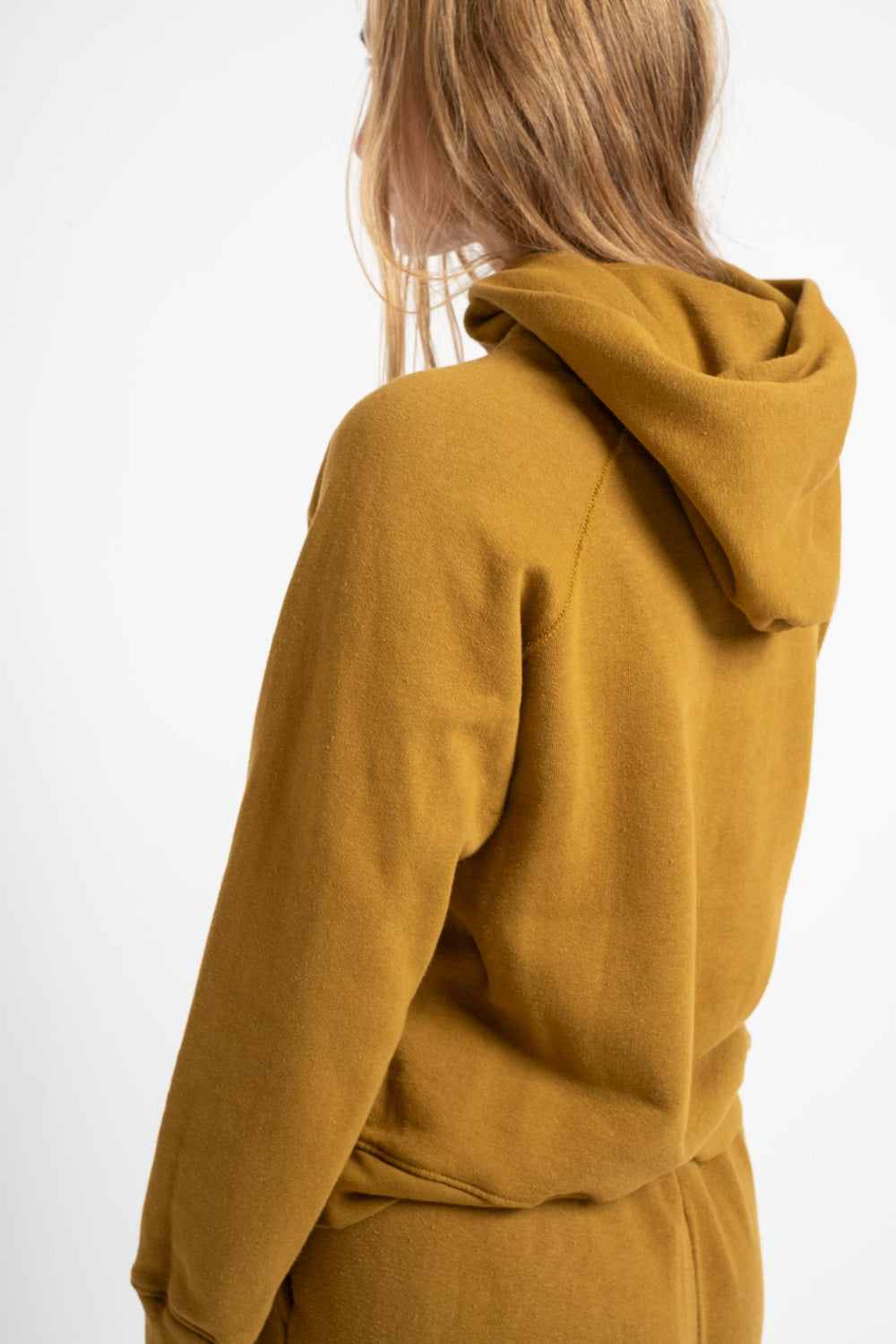 The Women's Hooded Sweatshirt in Mustard