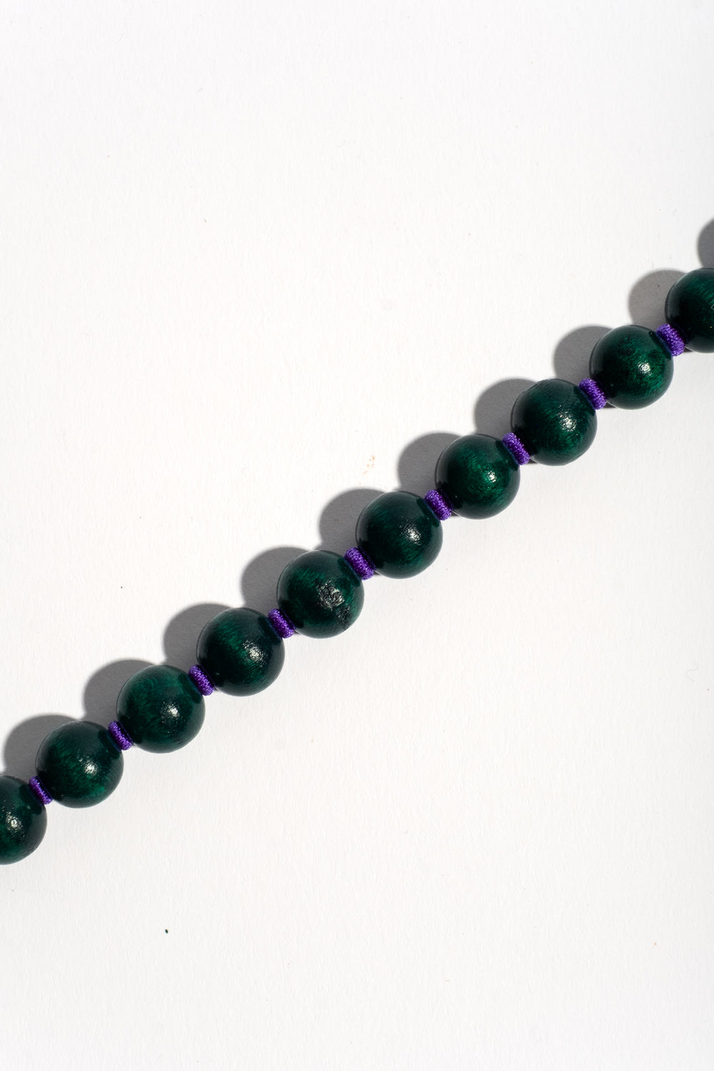 Perlen Short in Dark Green + Purple