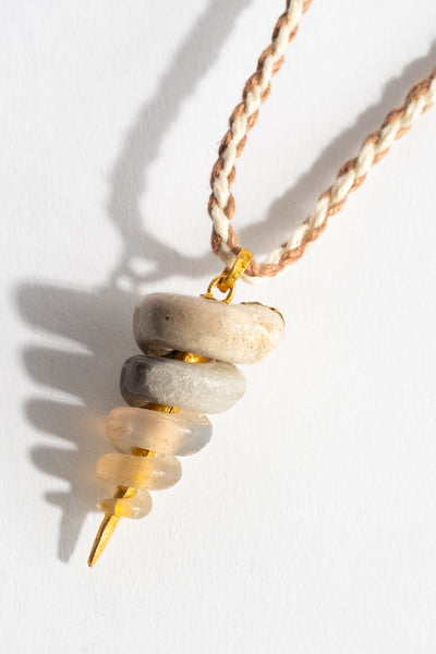 22K Fossilized Snail Pendant