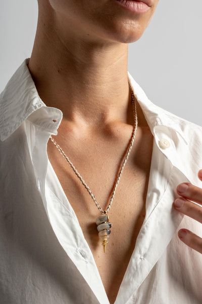 22K Fossilized Snail Pendant