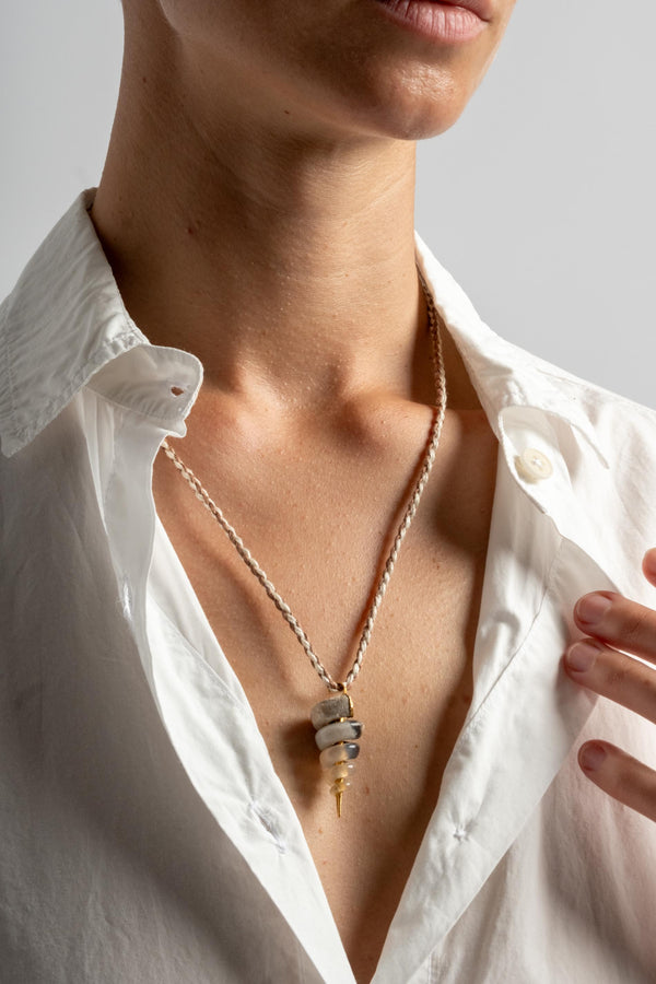 22K Fossilized Snail Pendant