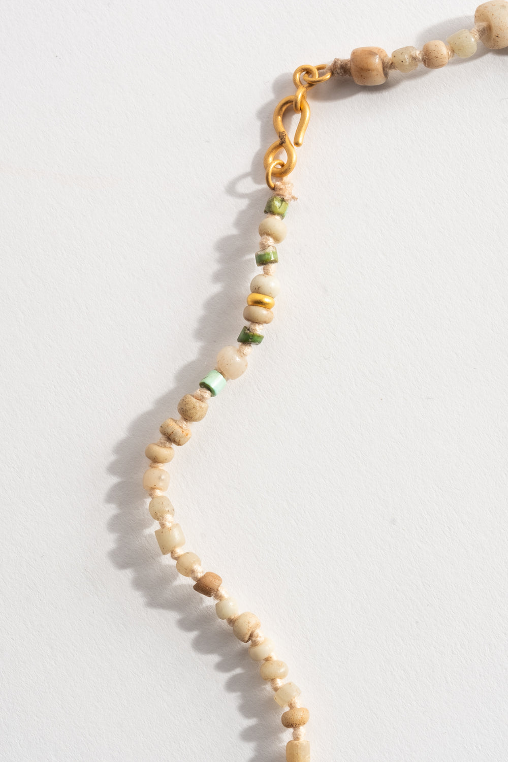 22K + Antique African Milk Glass Bead Strand