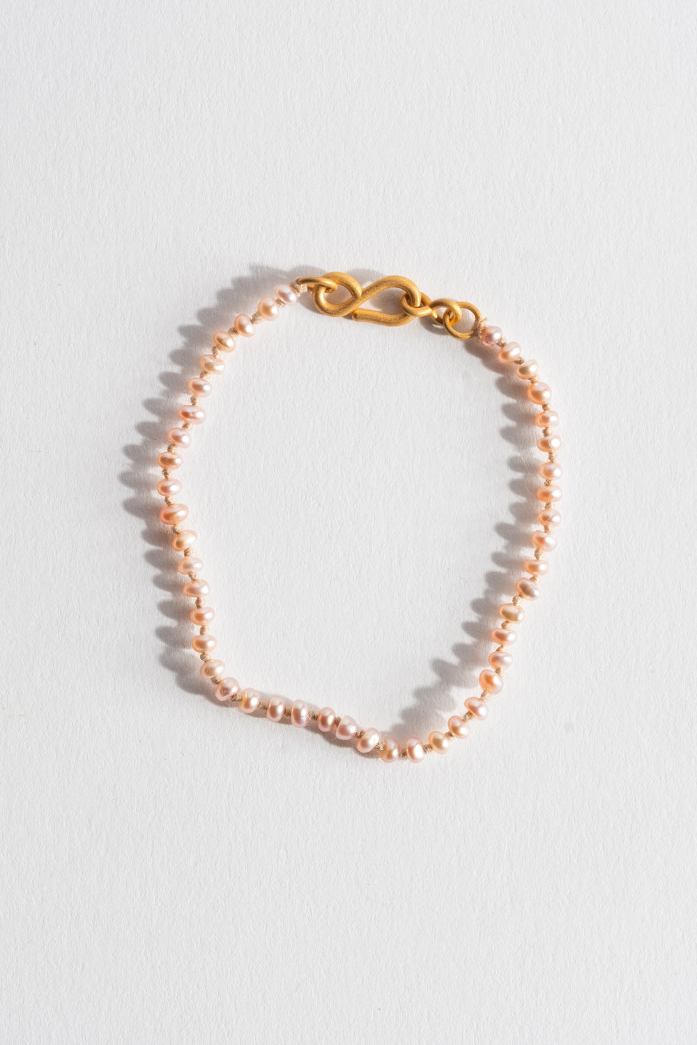 22K + Peach Pearl Strand Bracelet