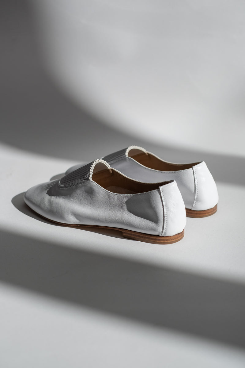 CAOMA IN WHITE