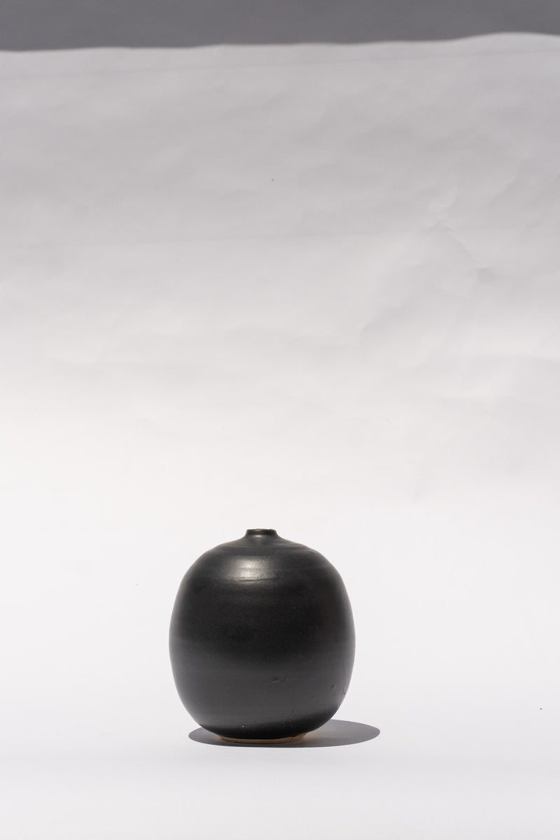 SMALL BOTTLE IN BLACK