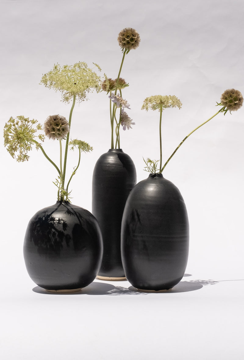 SMALL BOTTLE IN BLACK