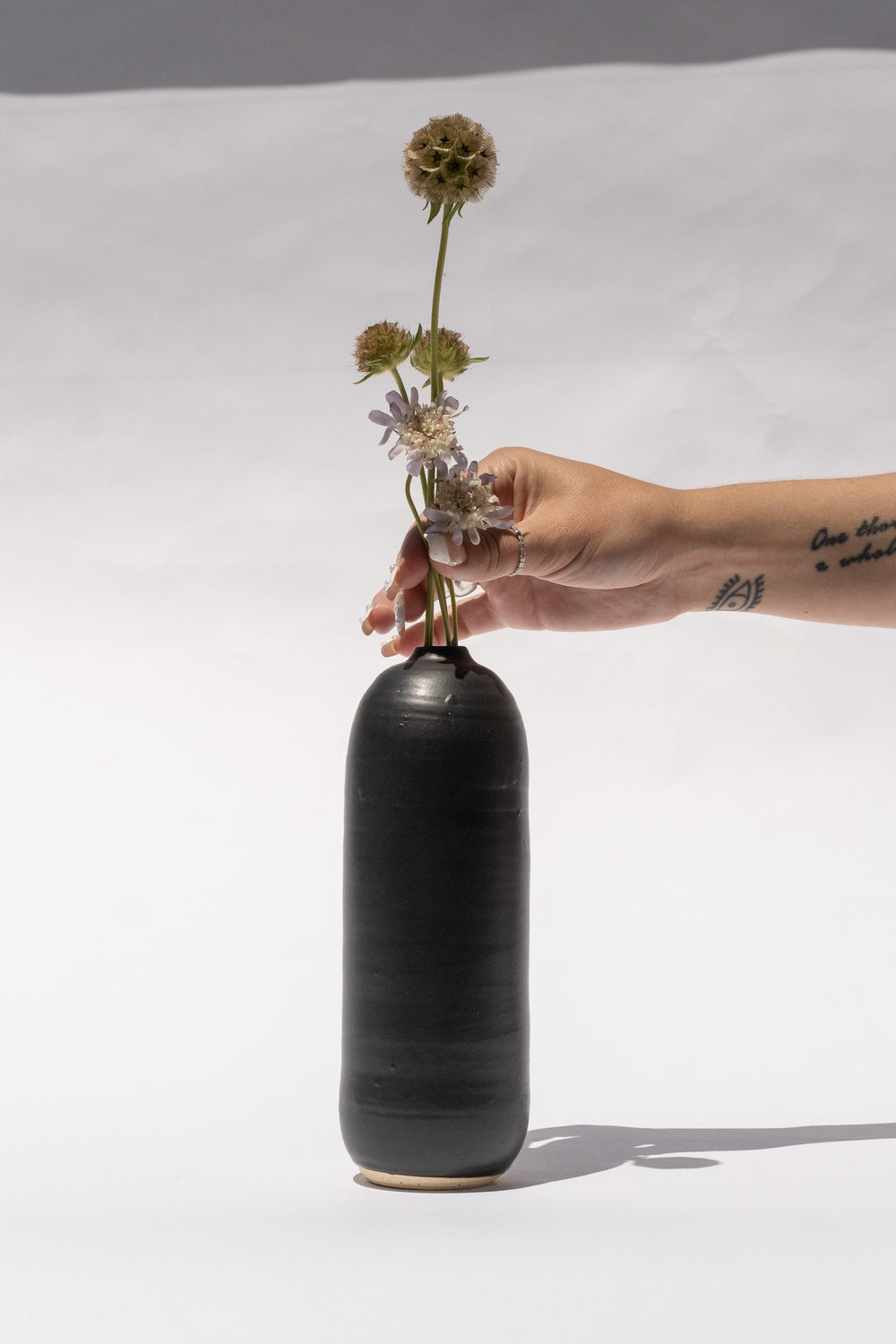 Small Bottle In Black