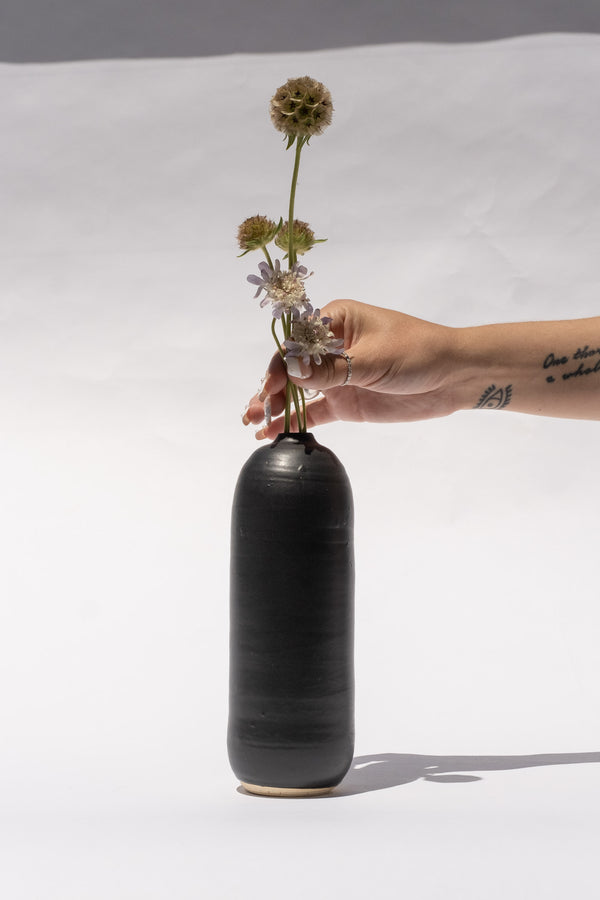 Small Bottle In Black
