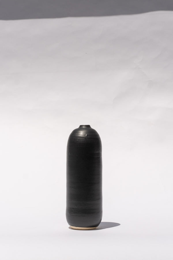 Small Bottle In Black