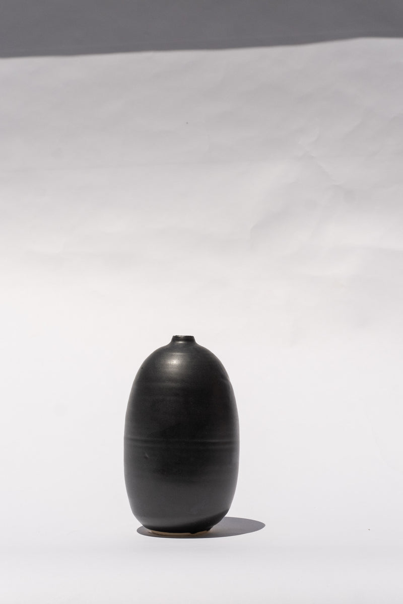 SMALL BOTTLE IN BLACK