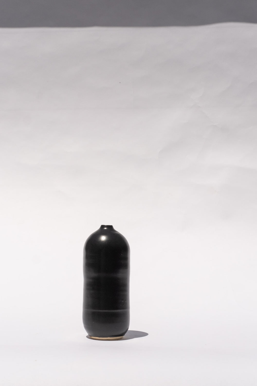 Tiny Bottle In Black