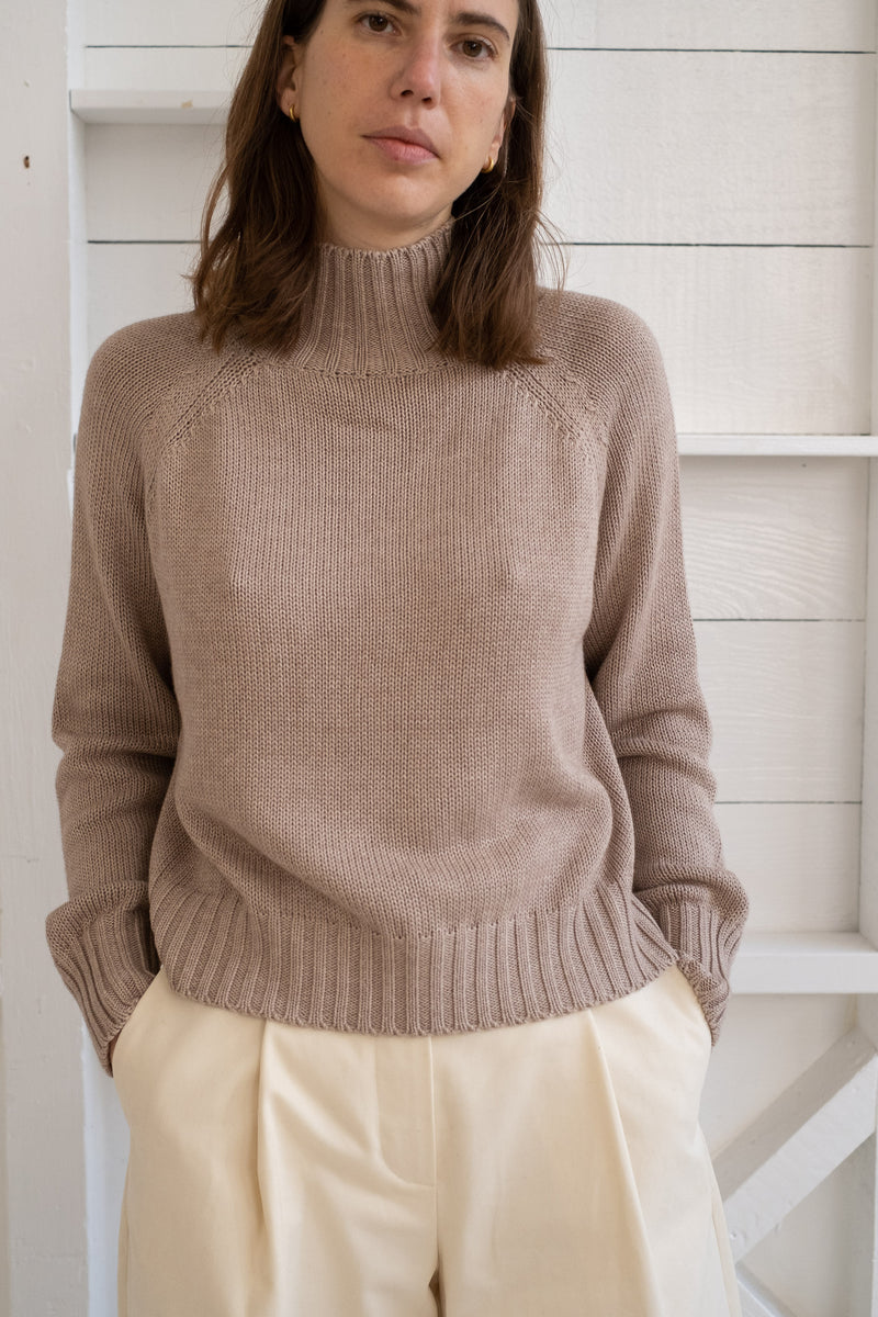 THE CROPPED TURTLENECK SWEATER IN SAND