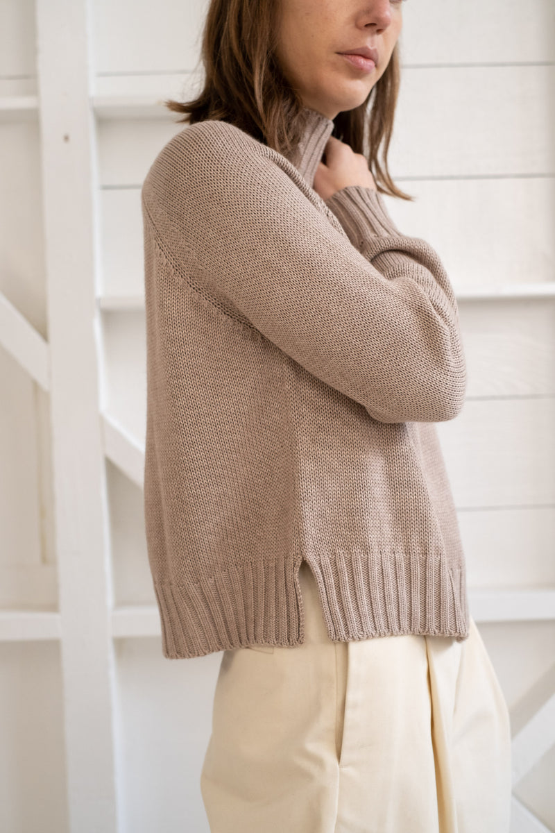 THE CROPPED TURTLENECK SWEATER IN SAND